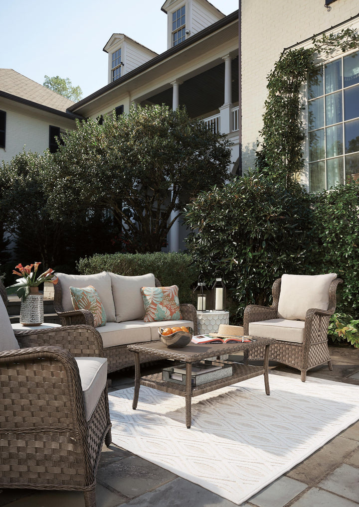 ASHLEY FURNITURE PKG011410 Outdoor Loveseat and 2 Chairs With Coffee Table