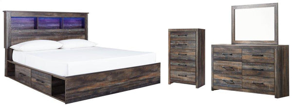 ASHLEY FURNITURE PKG003379 King Bookcase Bed With 2 Storage Drawers With Mirrored Dresser and Chest