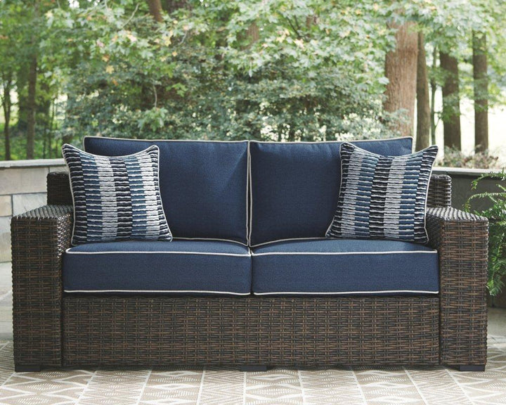 ASHLEY FURNITURE PKG008826 Outdoor Sofa and Loveseat With Coffee Table