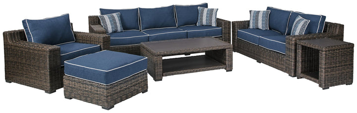 ASHLEY FURNITURE PKG014436 Outdoor Sofa, Loveseat, Lounge Chair and Ottoman With Coffee Table and End Table