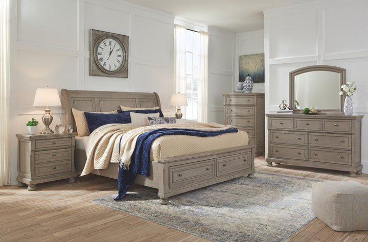 ASHLEY FURNITURE PKG006583 Queen Sleigh Bed With 2 Storage Drawers With Mirrored Dresser and 2 Nightstands