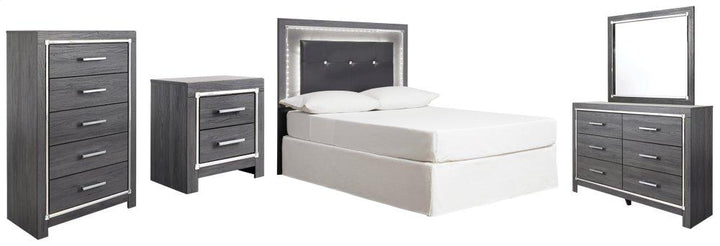 ASHLEY FURNITURE PKG003528 Full Upholstered Panel Headboard With Mirrored Dresser, Chest and Nightstand