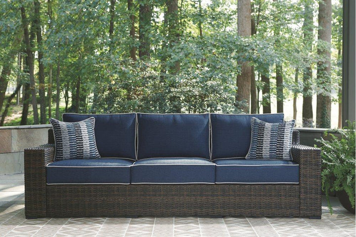 ASHLEY FURNITURE PKG008826 Outdoor Sofa and Loveseat With Coffee Table